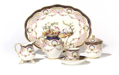 null Sèvres (kind of) Porcelain lunch composed of an oval tray, a covered teapot,...