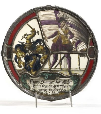 null Glass roundel with polychrome painted decoration of a nobleman holding a large...