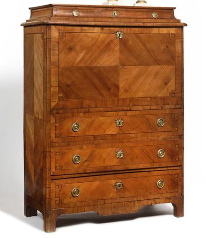 null Fruitwood and marquetry secretary with a shower, opening with four drawers and...