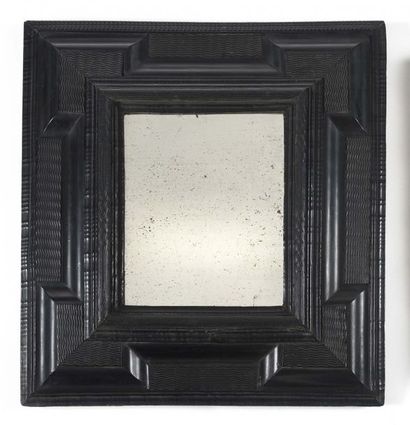 null Blackened wooden frame with wavy decoration with a recessed duck, Flanders,...