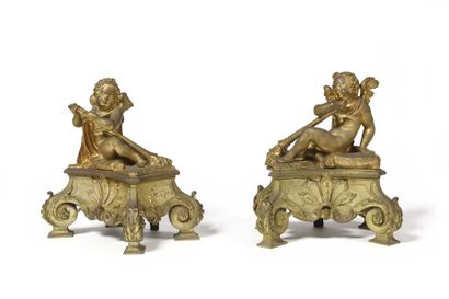 null Pair of gilt bronze winged children's crawlers, the palmette base resting on...