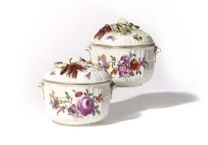 null Germany Pair of porcelain covered sugar pots with polychrome decoration of flowers,...