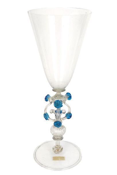 null VENICE Legged glass made of clear colourless glass and blue threads. Venice,...