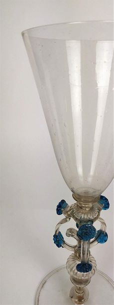 null VENICE Legged glass made of clear colourless glass and blue threads. Venice,...