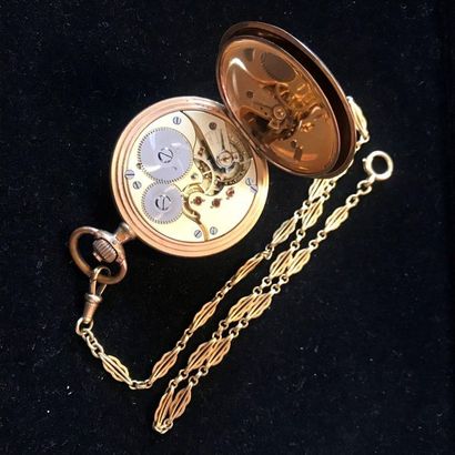 null GOLDEN METAL WATCH WITH GOLDEN CHAIN. Weight of the chain: 21.1 g.