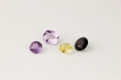 null Set of STONES comprising two amethysts and two coloured quartz.