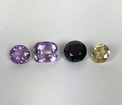 null Set of STONES comprising two amethysts and two coloured quartz.