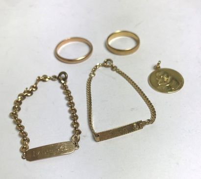null GOLD SET comprising : -two wedding rings -two christening bracelets -one christening...