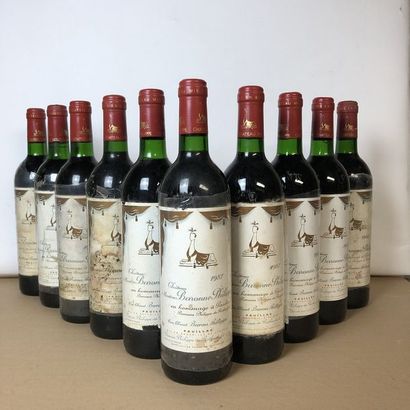 null 10 bouteilles : 1 CHÂTEAU MOUTON BARONNE PHILIPPE 1986 Pauillac, 9 CHÂTEAU MOUTON...