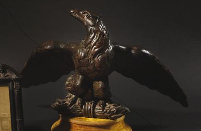 null Large building eagle in patinated cast iron, with wings spread out on a spindle...