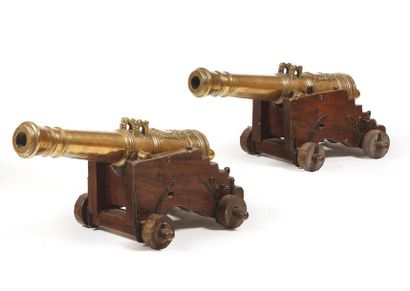 null 2. Pair of model navy party guns. Bronze barrels with six reinforcement rings,...