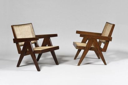 null PIERRE JEANNERET (1896-1967) "Easy chairs" Chandigarh, circa 1955 Pair of profiled...