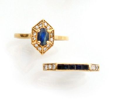 null 2 RINGS in 750 thousandths yellow gold decorated with sapphires and diamonds....