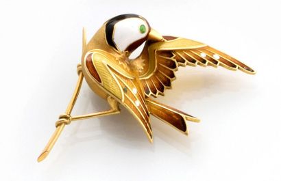 null Spindle in 750 thousandths yellow gold and enamel representing a bird Dimensions:...