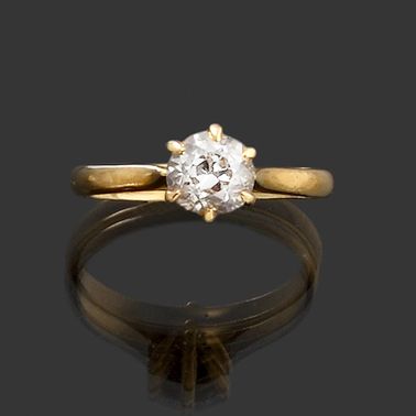 null SOLITAR RING in 750 thousandths yellow gold with an antique brilliant cut diamond...