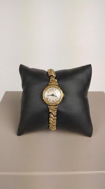 null LADY'S WATCH circa 1920 round case in 18k yellow gold. Grey dial, railroad and...
