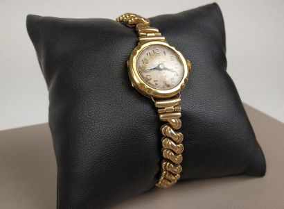 null LADY'S WATCH circa 1920 round case in 18k yellow gold. Grey dial, railroad and...