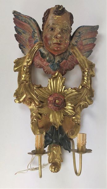 null ANGEL'S HEAD in resinous resin sculpted in applique, polychromed and gilded...