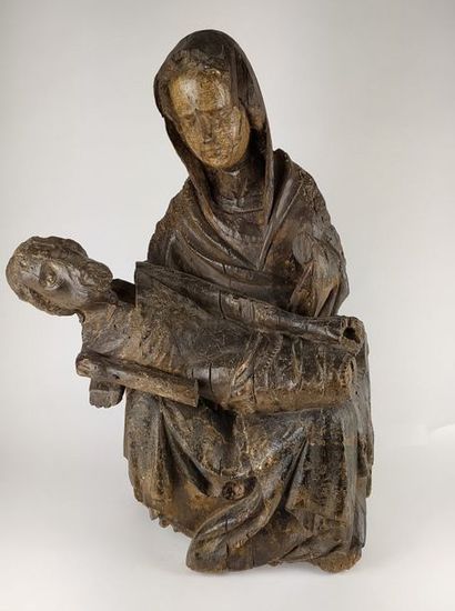 null VIRGIN OF PITIE in carved and polychromed wood, hollow back. Mary is sitting,...