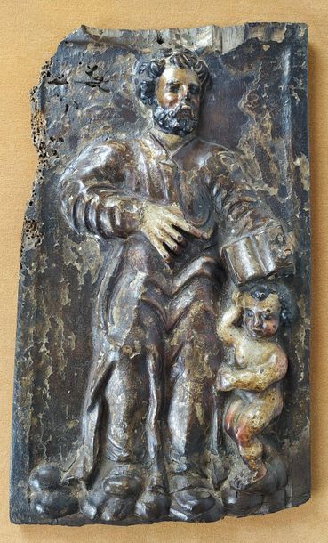 null PANNEAU en noyer sculpté en bas-relief et polychromé représentant saint Matthieu,...