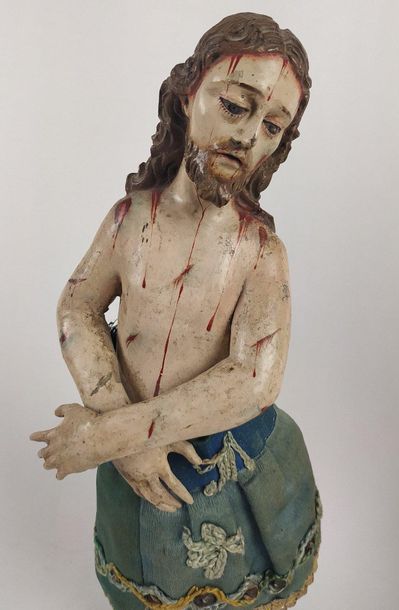 null CHRIST AUX LIENS in wood carved in the round and polychromed, glass eyes. The...