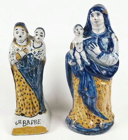 null NEVERS Deux figurines en faience représentant des Vierges à l'enfant traitées...