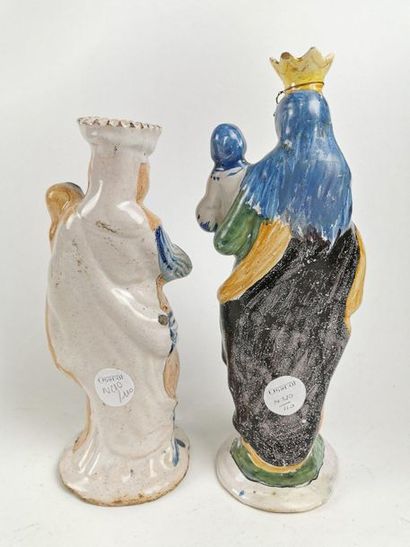 null NEVERS Two large earthenware figurines depicting Birth Virgins holding the child...