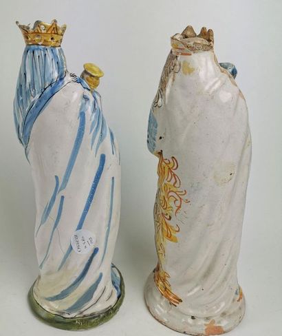 null NEVERS Two large earthenware figurines depicting Virgins in labour holding the...