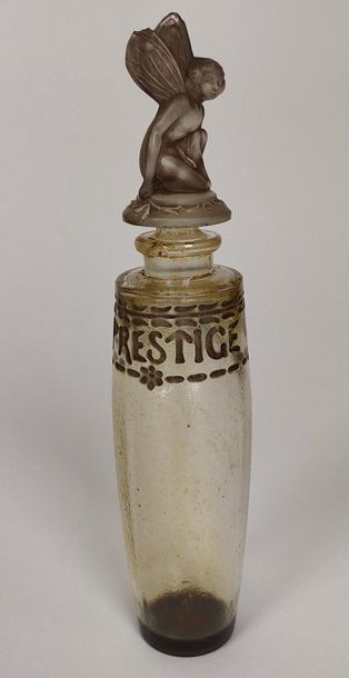 null GUELDY " Le Prestige " Glass bottle, cylindrical shape, enamelled decoration...