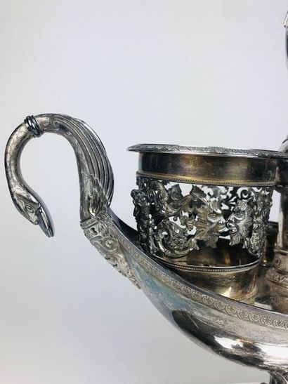  OIL-WINE HOLDER HOLDER of shuttle shape in silver chiselled with palmettes and foliage,...