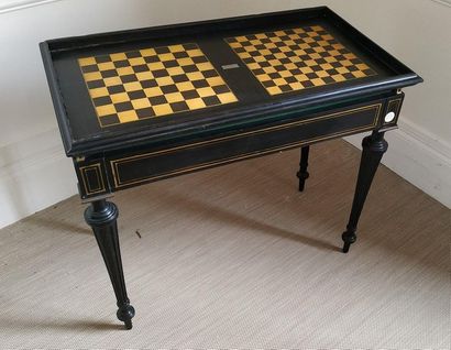 null Rectangular GAMES TABLE in blackened pearwood, decorated with brass net, tapered...