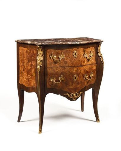 null COMMODE in veneer wood and floral marquetry opening by two drawers on two rows...