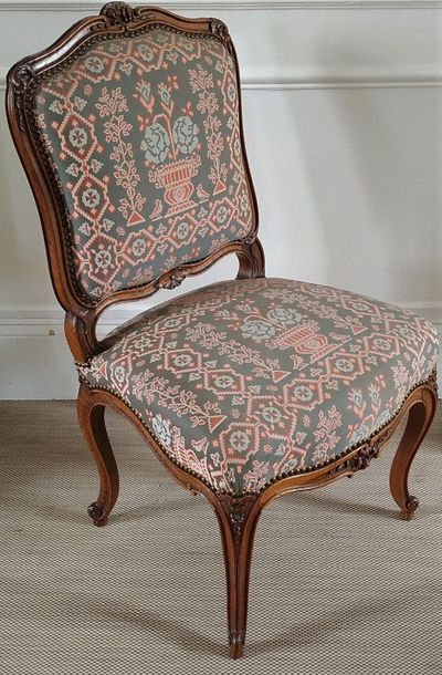 null PAIR OF FALLS and PAIR OF CHAIRS in moulded and carved wood with a moving backrest....