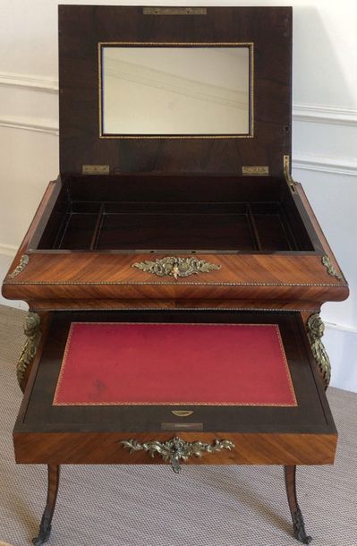 null WORKER in veneer and marquetry open by a belt drawer forming a writing desk...