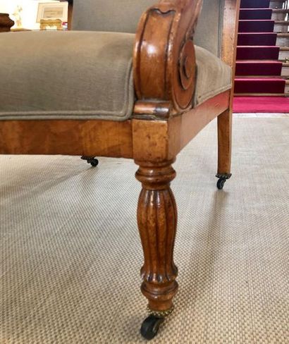 null VOLTAIRE FALSE in mahogany, console armrests, it rests on two front tulip feet...