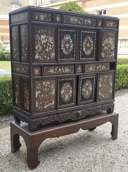 null CABINET in stained wood inlaid with mother-of-pearl including drawers and shelves....