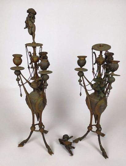  Pair of bronze CANDELABRES with a double patina, decorated with Etruscan vases holding...