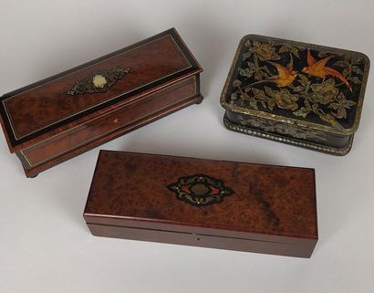 null Three GLOVE BOXES in blackened wood and magnifying glass. Napoleon III period...