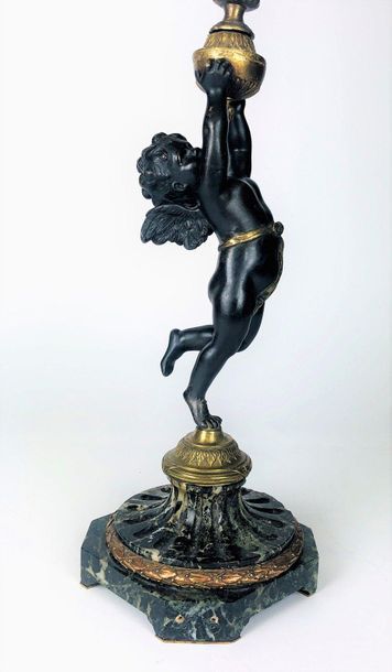 null CANDELABRE mounted in bronze lamp with double patina and decorated with a cherub...