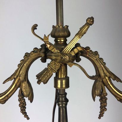 null CANDELABRE mounted in bronze lamp with double patina and decorated with a cherub...