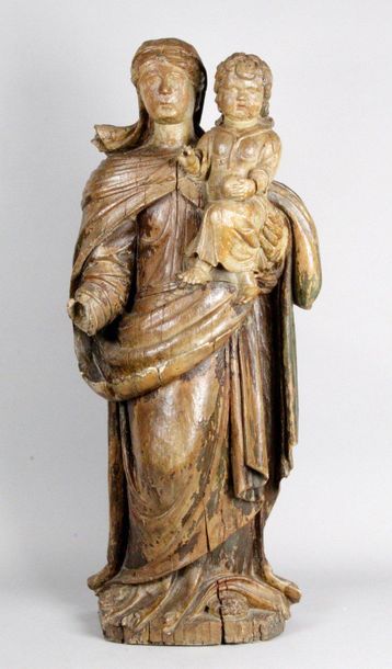 null Vierge à l'Enfant en bois sculpté avec traces de polychromie. Debout, portant...