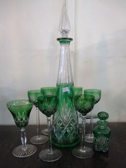 null A small green lined cut crystal liqueur set

A carafe, six glasses, a small...