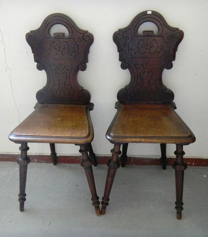 null A pair of carved wooden chairs from Lorraine. Cracks in the seat