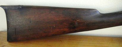null An antique rifle in poor condition
