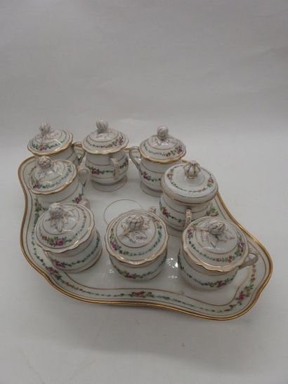 null Paris porcelain dessert service with flower decoration. A missing cup, and a...