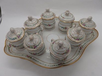 null Paris porcelain dessert service with flower decoration. A missing cup, and a...