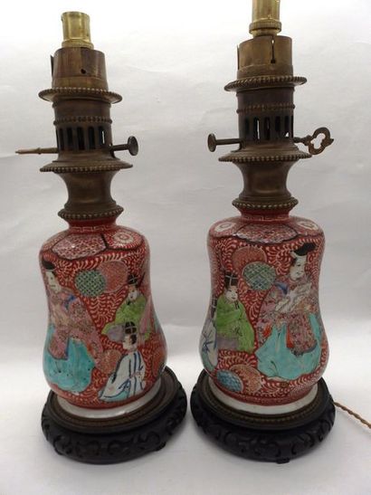 null Pair of Japanese porcelain kerosene lamps. Two glass globes and tubes.