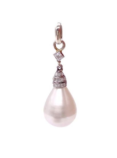 null PENDANT holding a fine pearl adorned with pink cut diamonds (missing 1) and...