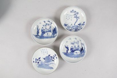 null CHINE, XIXe siècle QUATRE coupelles en bleu de Hué à décor de personnages et...