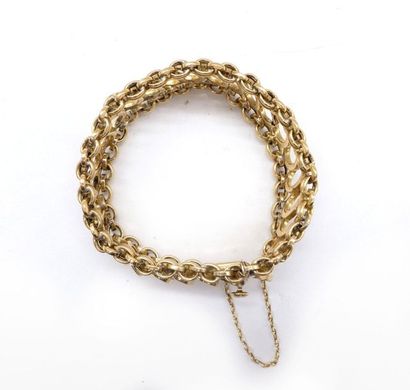 null BRACELET in 18K yellow gold retaining a succession of round geometric links....